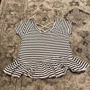 black and white striped top with ruffles on bottom